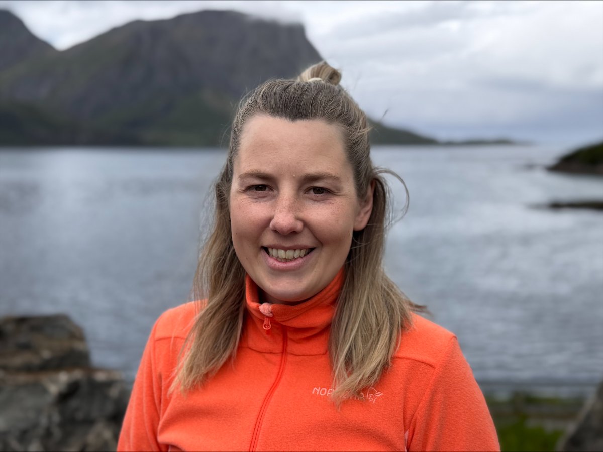 Woman smiling by the water